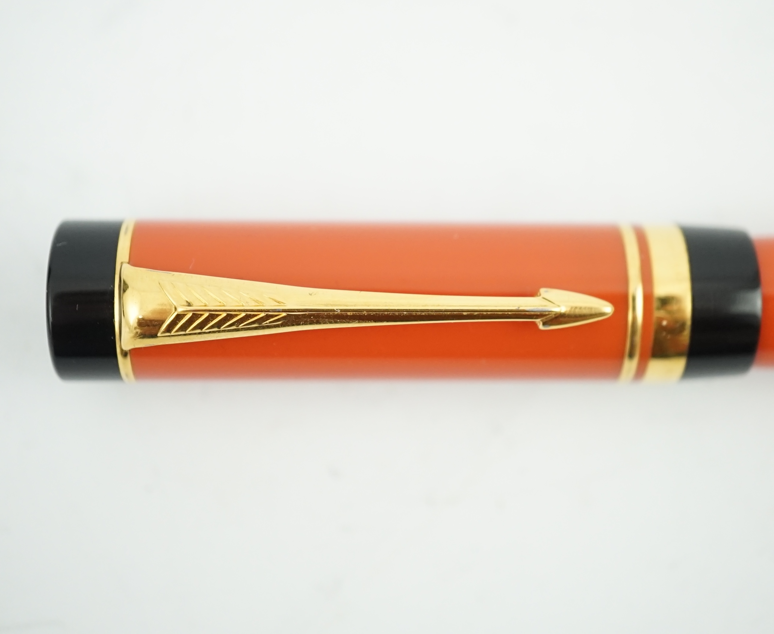 A Parker Duofold orange international fountain pen, in black case